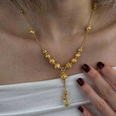 22 Ayar Altın Dorika Kolye – Sallantılı Kumlu Tasarım